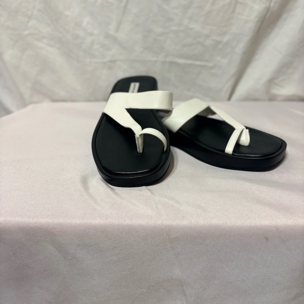 Saks Fifth Avenue round toe-strap platform leather sandals in black and white.